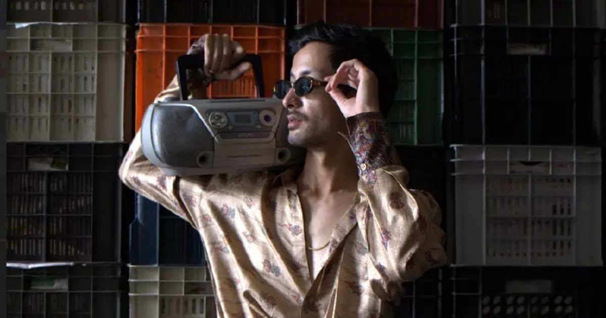 DJ Boh!B (Siddharth Negi) holding a boombox — Besharam nightlife curator